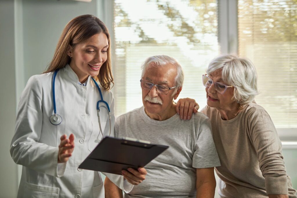 Mature couple having an appointment with a doctor in the office.