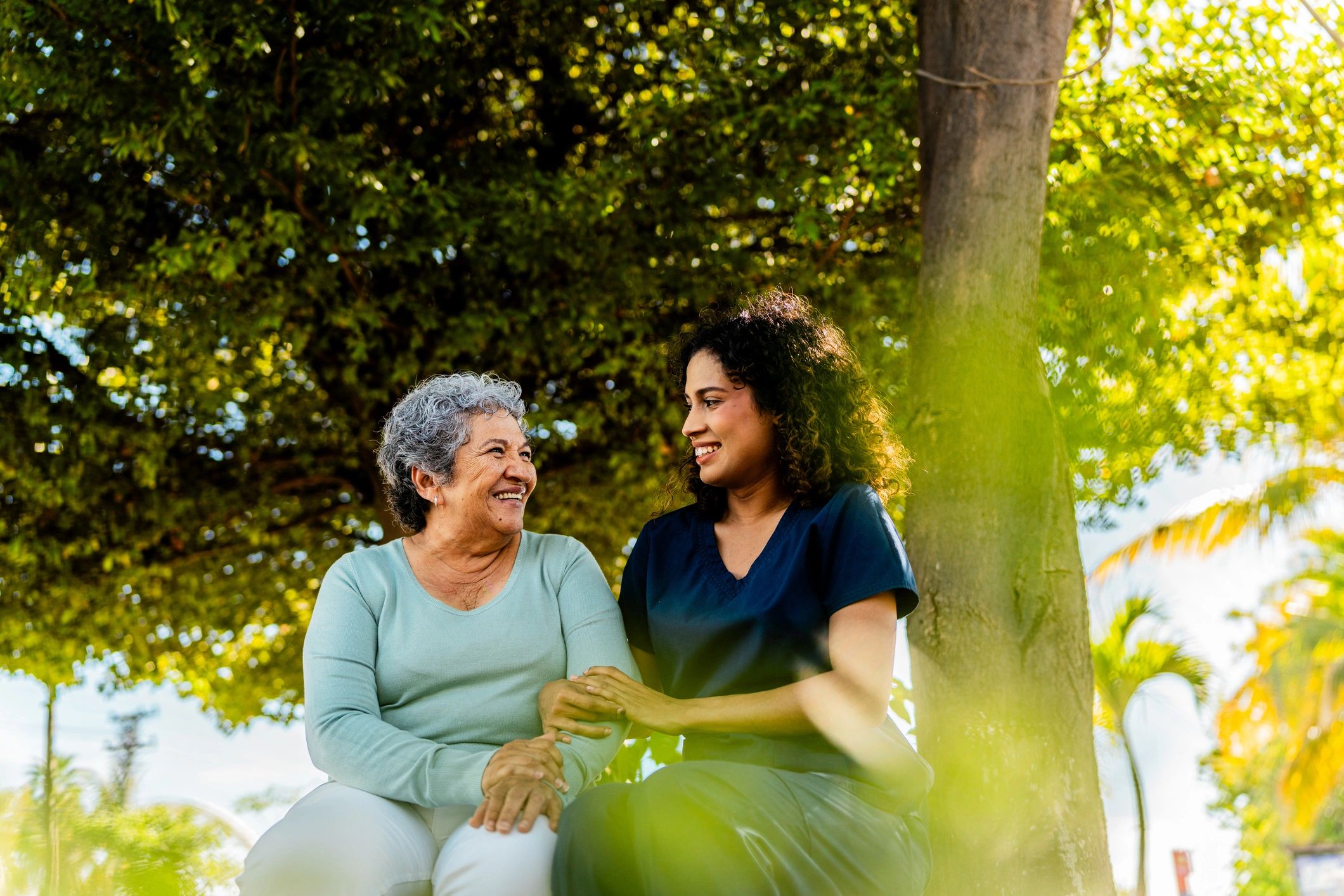 Caregiver supporting a senior resident